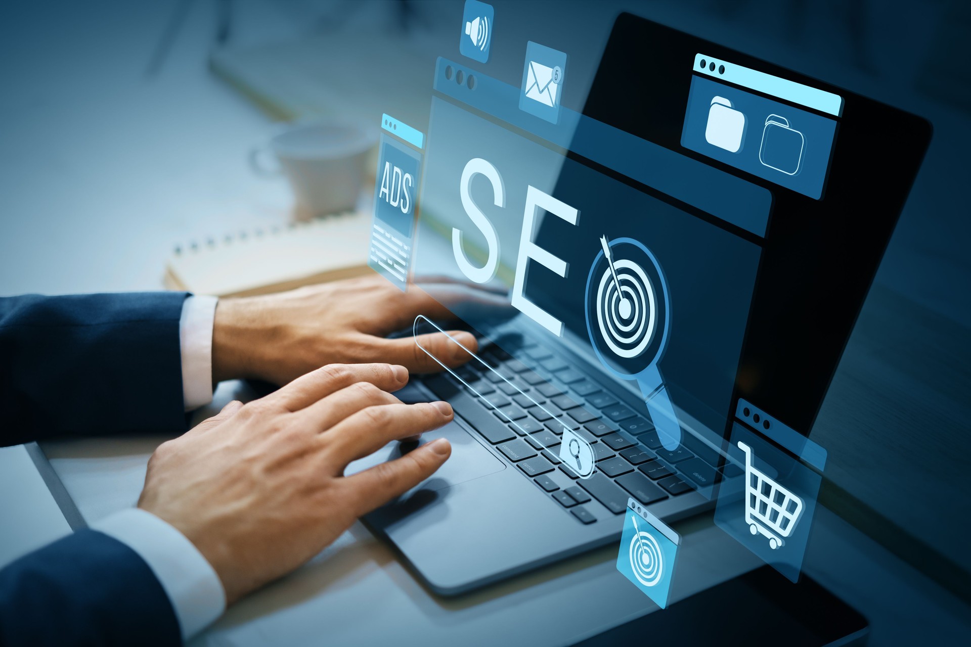 Digital marketing strategy concept showing SEO optimization tools and ecommerce icons on laptop screen with business person using keyboard.